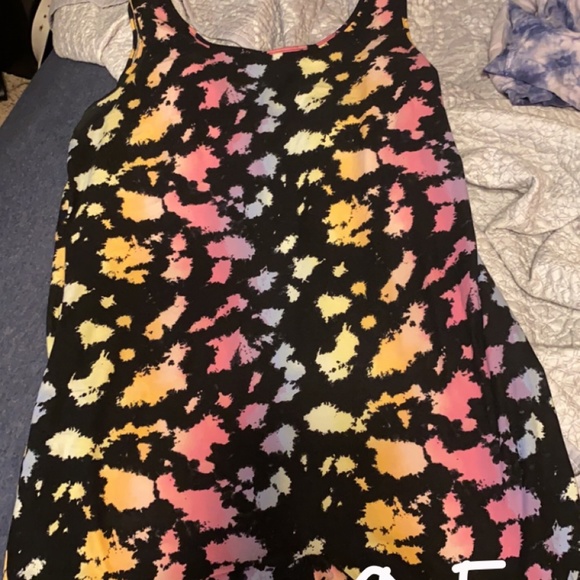 Jumpsuits and dresses - Picture 4 of 6